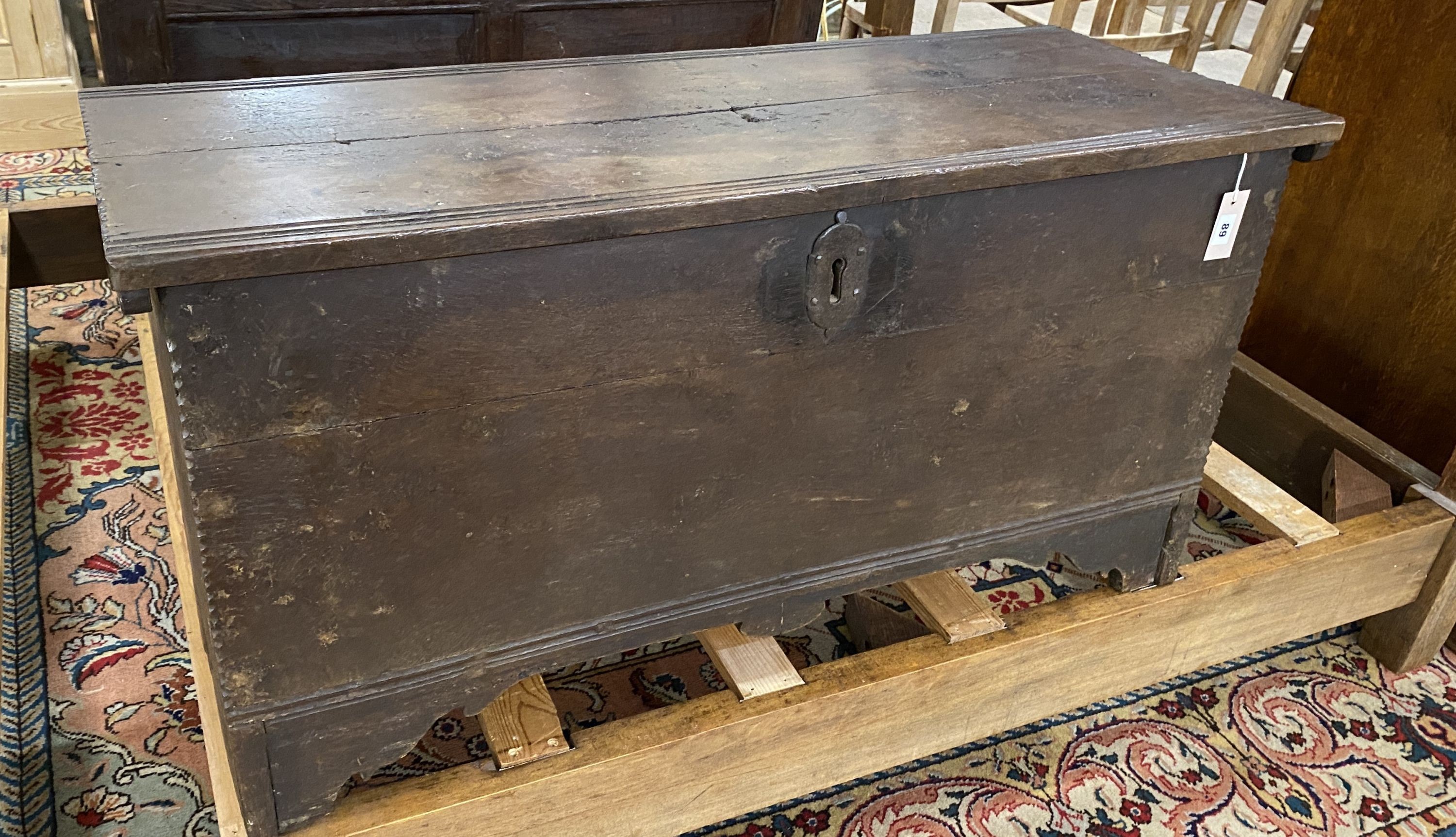 An 18th century oak coffer, length 111cm, depth 43cm, height 56cm